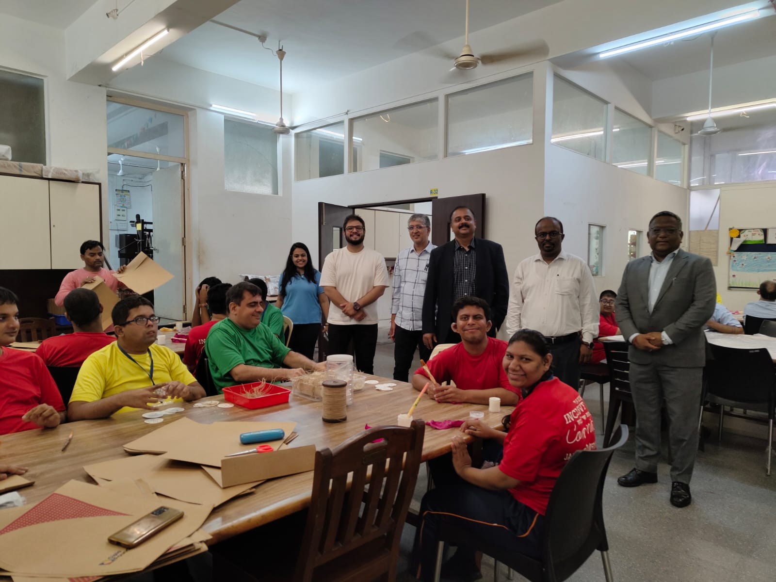 ICRA volunteers with participants at a craft workshop run by a special needs centre